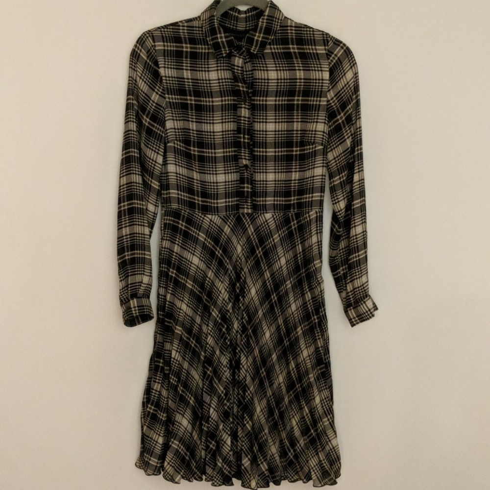 Button down, plaid dress with pleated skirt.